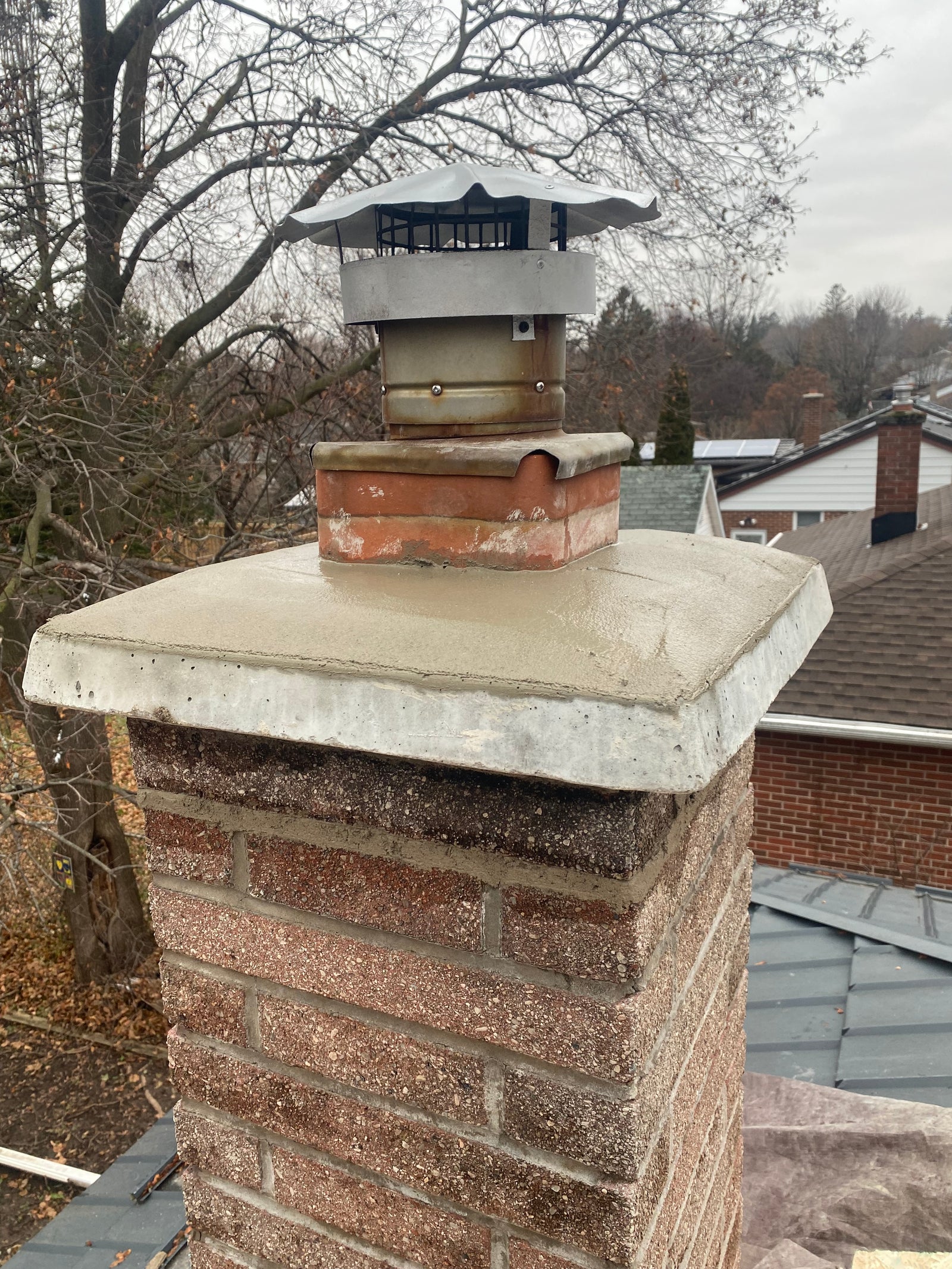 Chimney Repairs: Concrete Cap