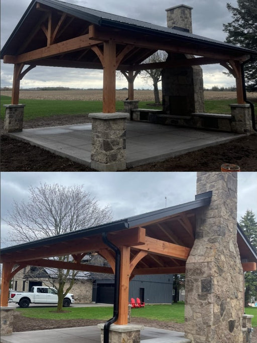 Wooden pavilion with stone pillars in a park setting